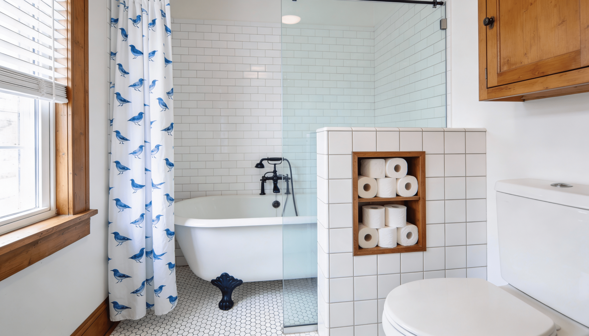 toilet nook tucked behind a half wall