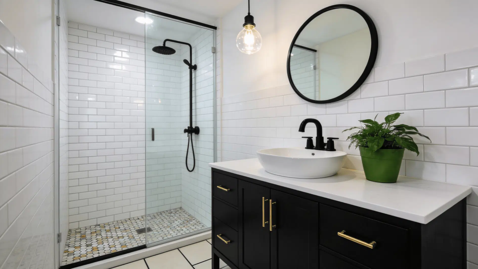 Bright small bathroom with glass shower, white subway tile, pebble floor, and matte black fixtures beside a dark vanity