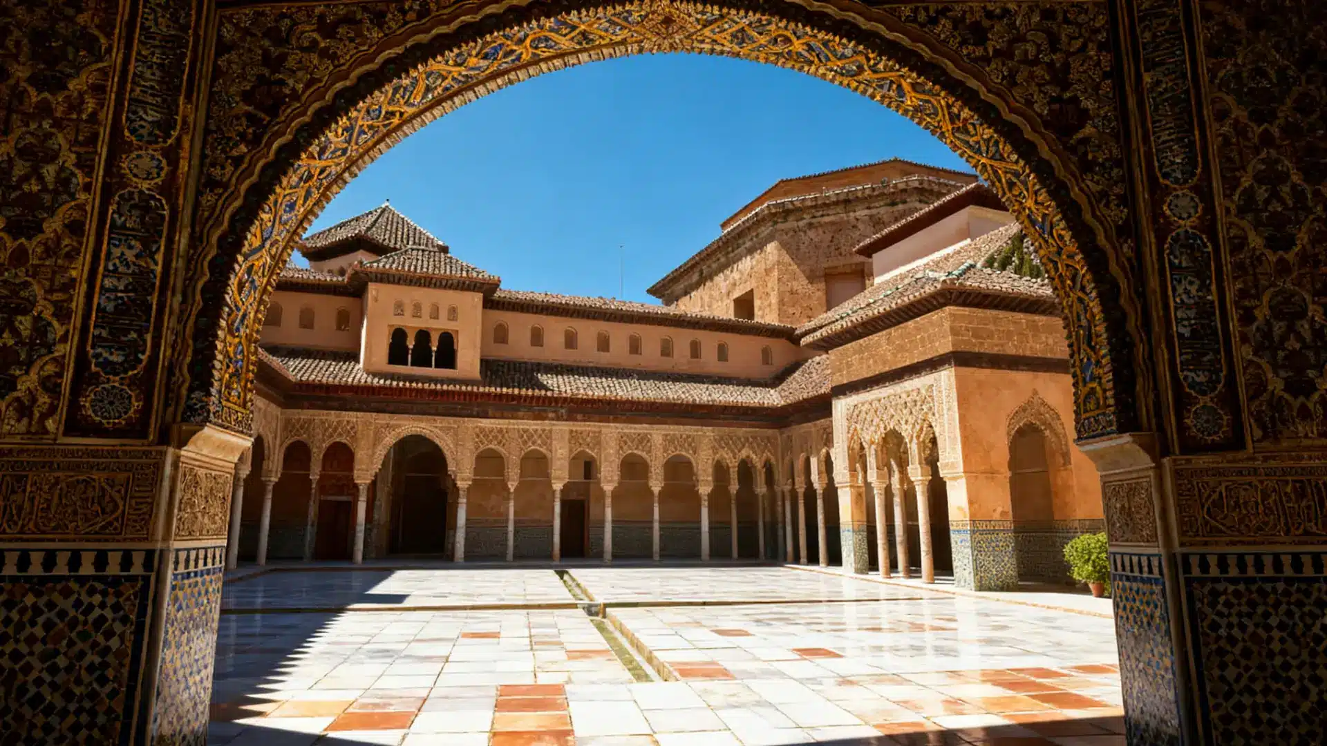 Andalusian Architecture History Features Examples seen in a courtyard with tiled roofs and many small arched windows