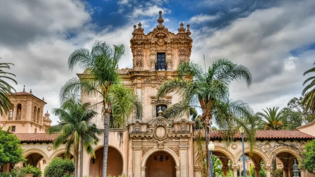 Famous Spanish Colonial Architects and Signature Works shown as a tan building with arches palm trees and garden paths