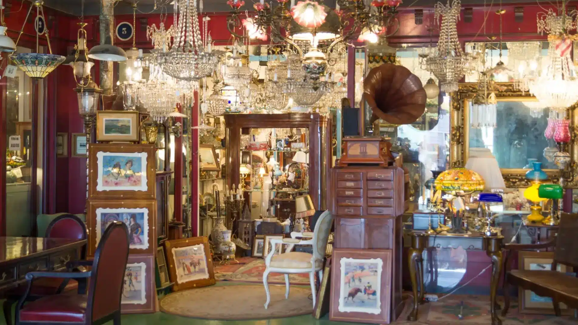 Mercantic Furniture Market Spain, filled with vintage chandeliers, antique furniture, and colorful decor