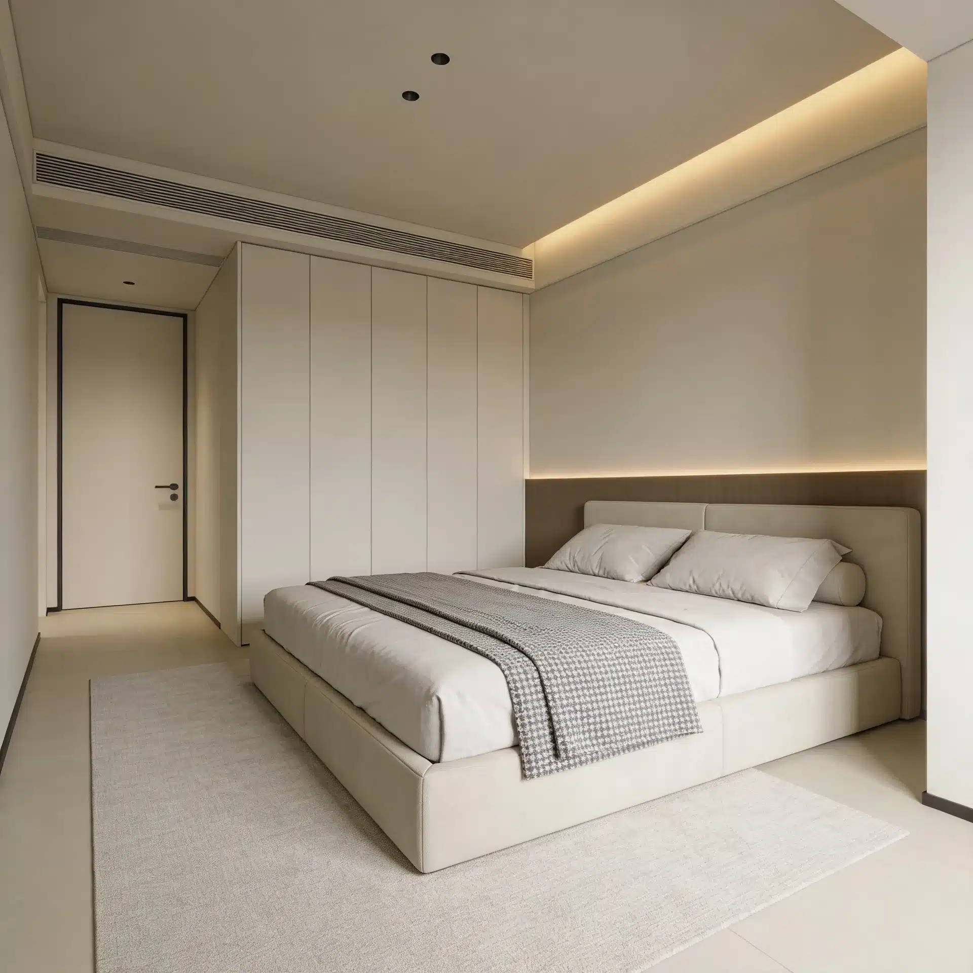 Minimalist modern bedroom featuring a low-profile upholstered bed, full-height white wardrobes, recessed lighting, and a light beige rug