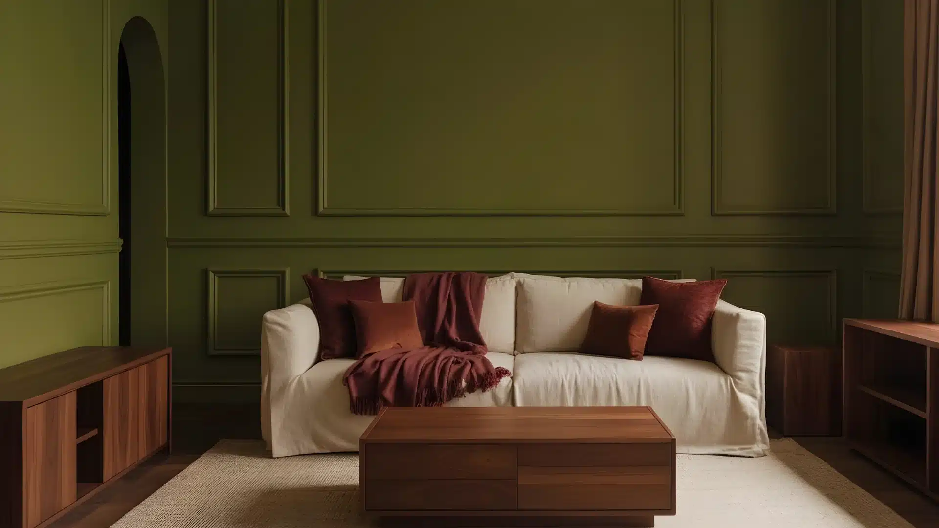 A living room featuring a cream sofa with burgundy cushions against a dark olive green wainscoted wall, centered by a modern wooden coffee table