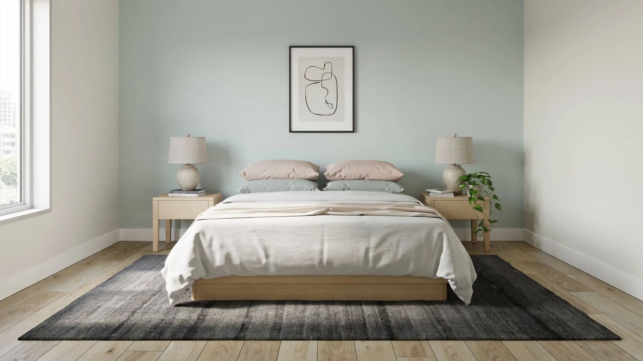 Modern bedroom with a light wooden bed frame, neutral-toned bedding, and matching nightstands against a pale blue accent wall.