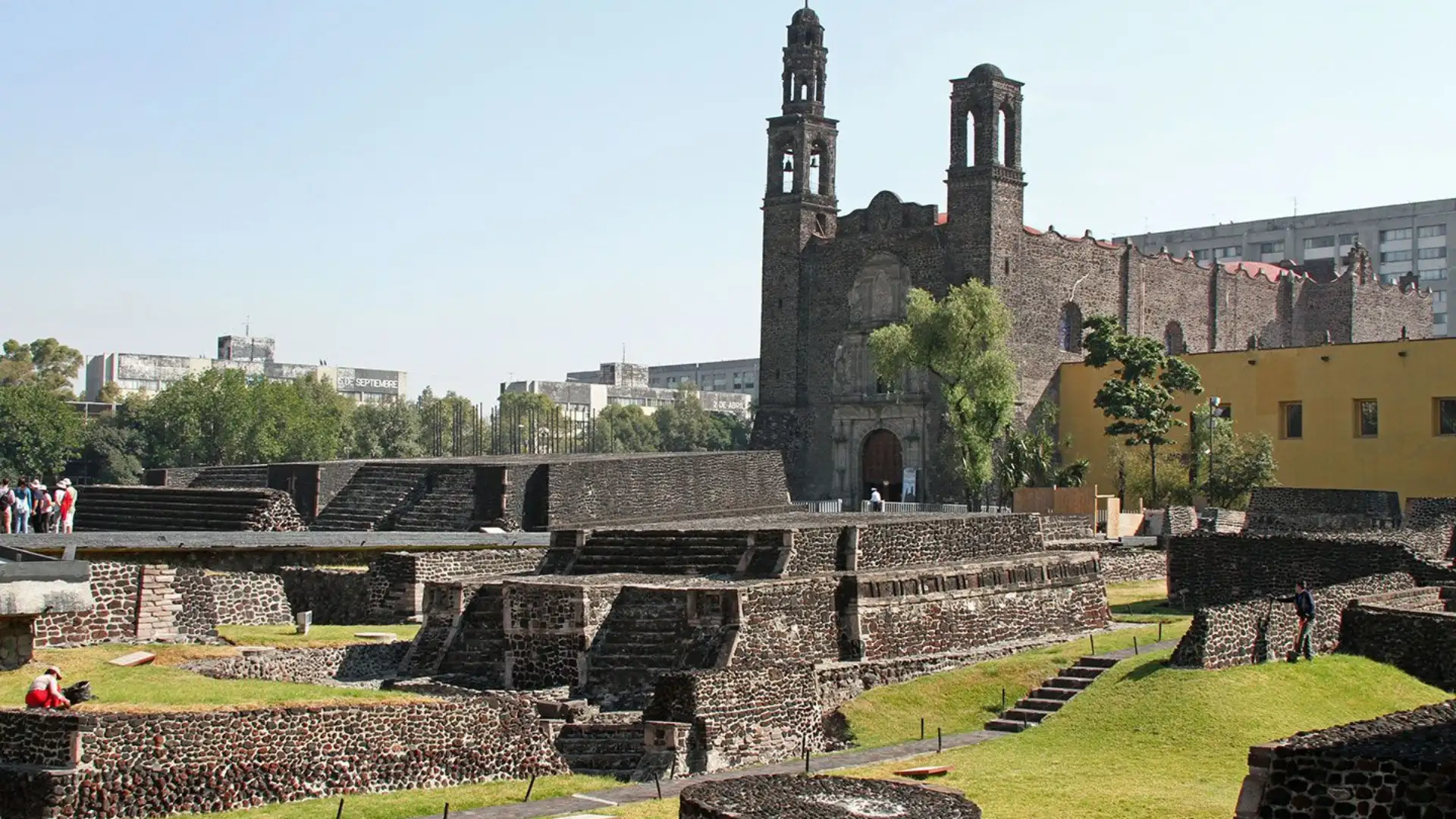Tlatelolco archaeological site in Mexico City with ancient stone ruins and a historic church.